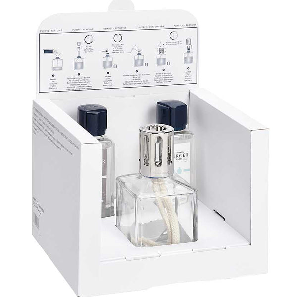 Perfume bottle with packaging and instruction sheet on a white background