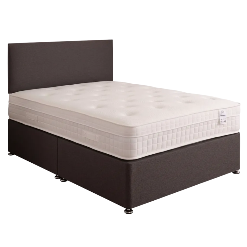 Bed with white mattress and brown frame on a white background
