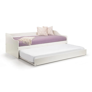 White bed with a purple mattress and decorative pillows on a white background