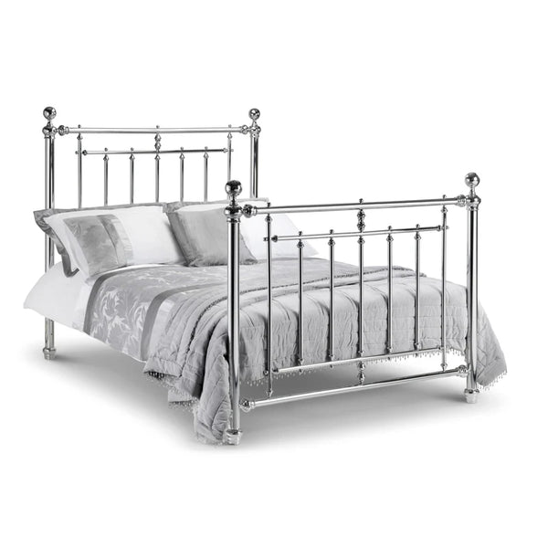 chrome bed frame on a white background with grey bedding