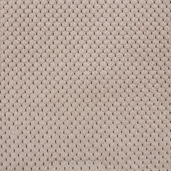 Textured beige material with a subtle pattern