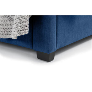 Blue upholstered bed with black legs on a white background