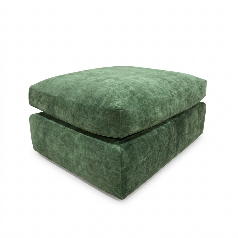 Green footstool on a white background