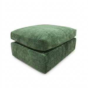 Green footstool on a white background