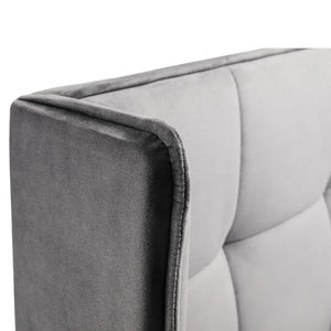 Gray upholstered headboard corner on a white background