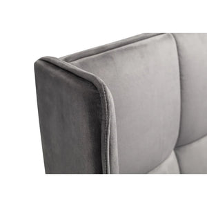 Gray sofa with a tufted backrest on a white background