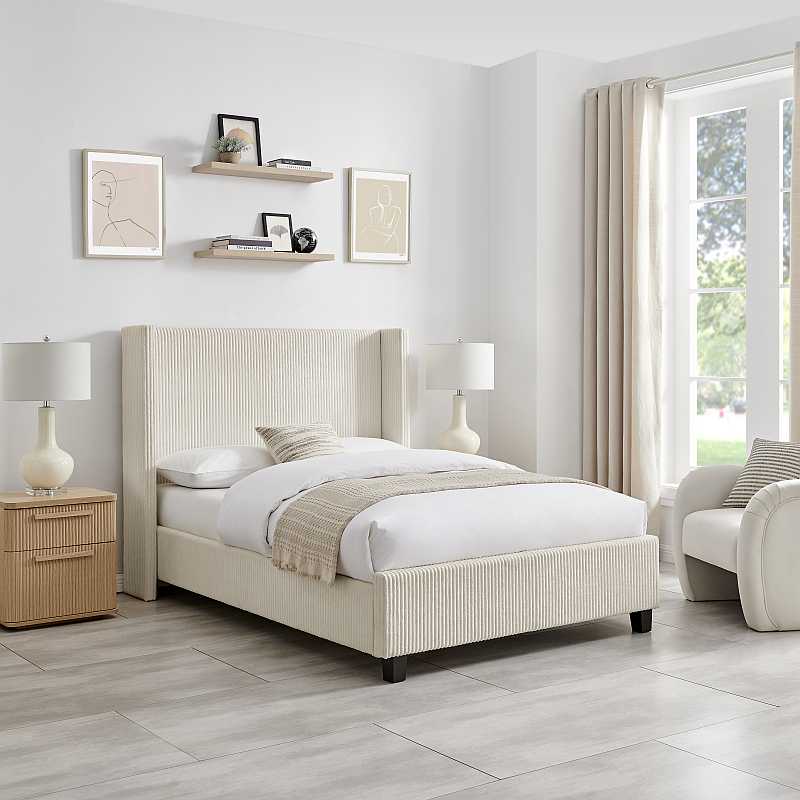 Beige upholstered bed frame on a white background