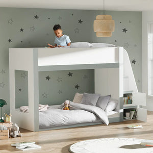 Children's room with a white loft bed and gray lower bed, decorated with star decals on the wall.