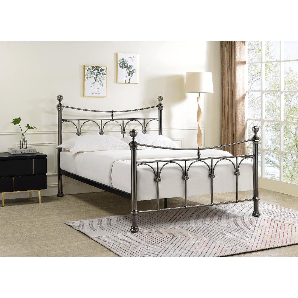 Metal bed frame with wooden slats on a white background
