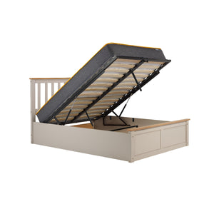 Beige bed frame with open storage compartment on a white background