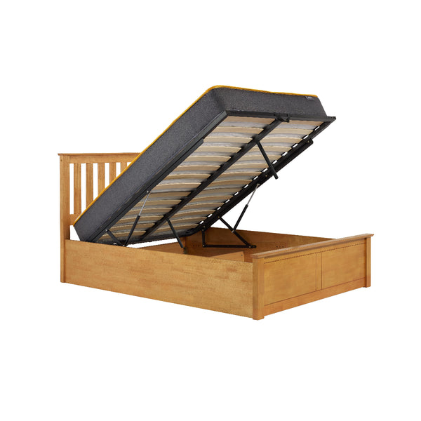 Wooden bed frame with an open storage compartment on a white background