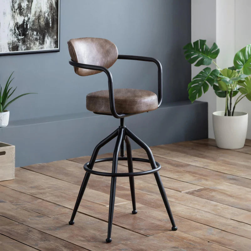 Brown bar stool with black metal frame on a white background