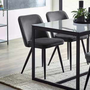 Dining table with GREY chairs in a modern room setting