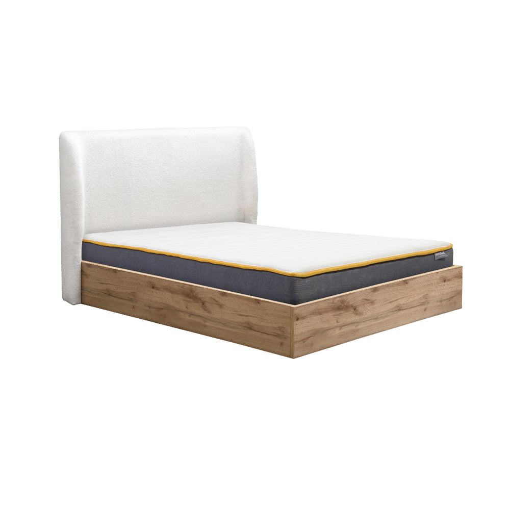 Bed with white upholstered headboard and wooden frame on a white background