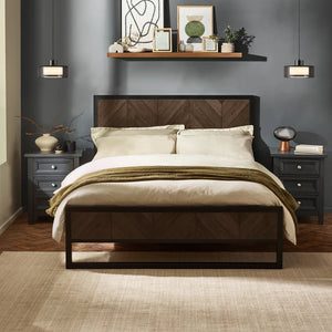 Modern bedroom with wooden bed, nightstands, and decorative elements.