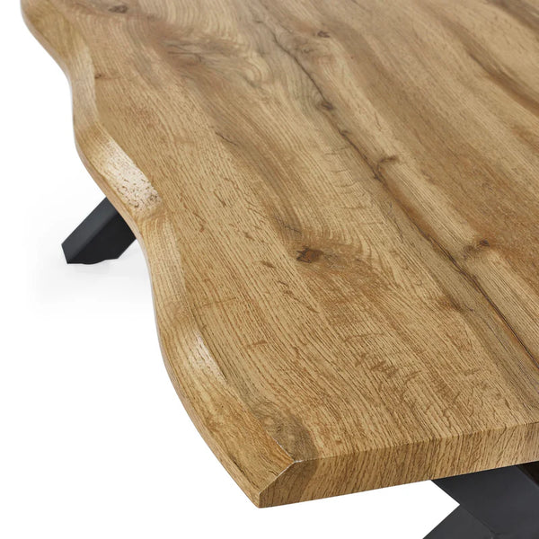 Close-up of a wooden table with a natural finish on a white background