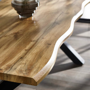Close-up of a wooden table with a natural finish