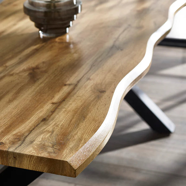 Close-up of a wooden table with a natural finish