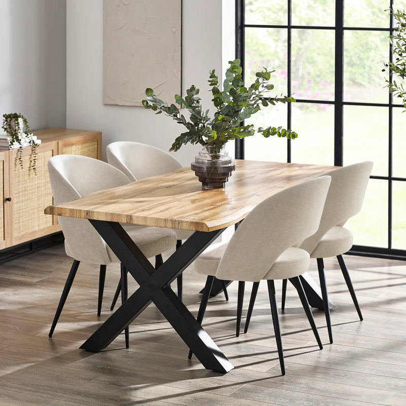 Wooden table with black metal legs on a white background