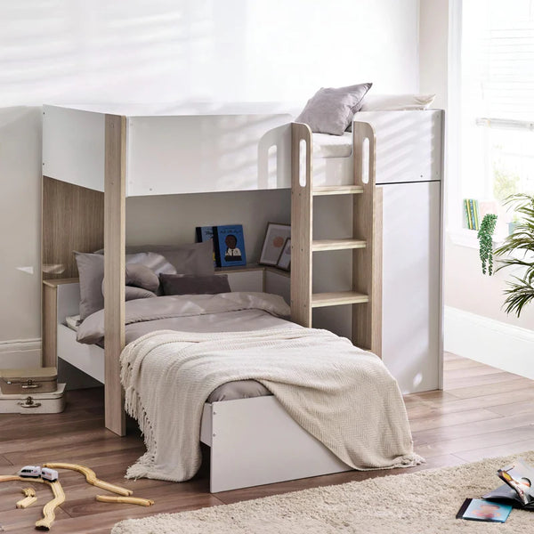 Bunk bed with shelves in a room with toys on the floor