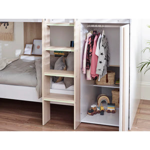 Children's wardrobe with open doors showing clothes and toys in a bedroom setting.
