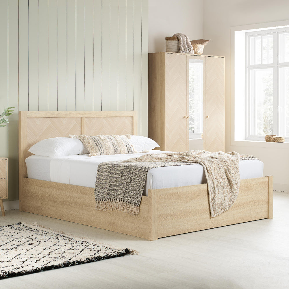 Wooden bed frame with storage compartment on a white background