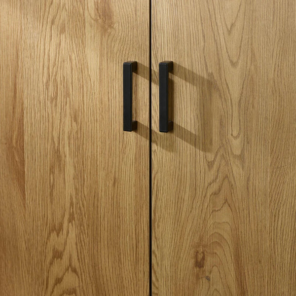 Wooden cabinet with black handles