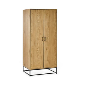Wooden cabinet with black metal legs on a white background
