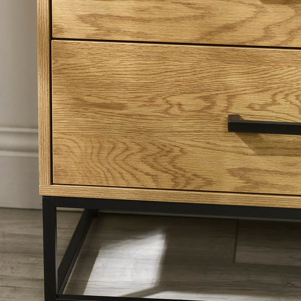 Wooden drawer with metal handle on a wooden floor