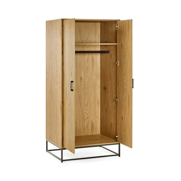 Wooden wardrobe with open doors on a white background