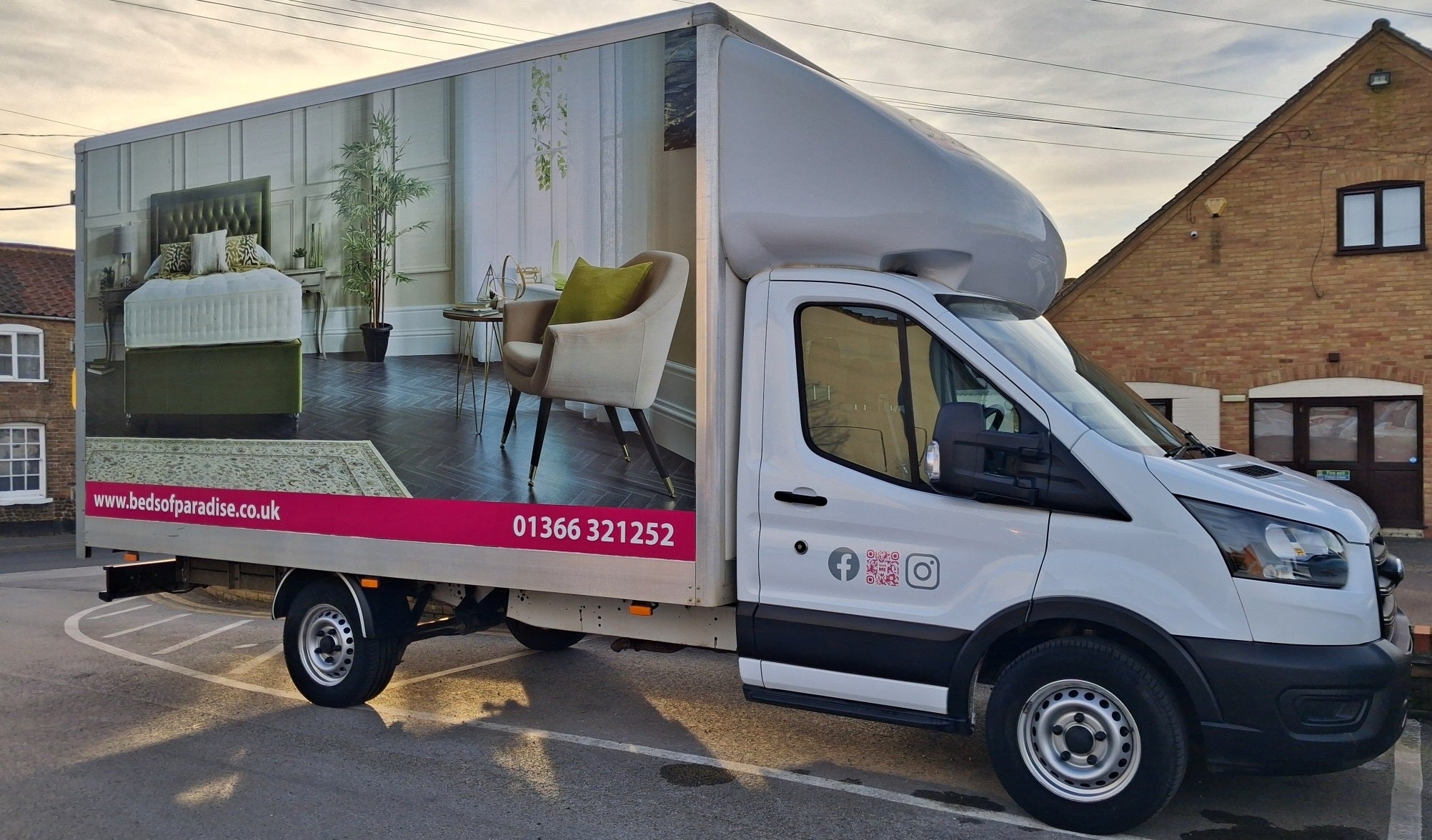 Beds of Paradise delivery van with street background
