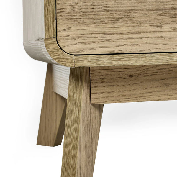 Close-up of a wooden side table with a white background
