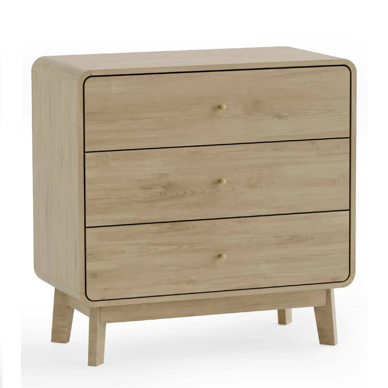 Wooden dresser with three drawers on a white background