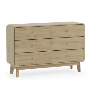 Wooden dresser with six drawers on a white background