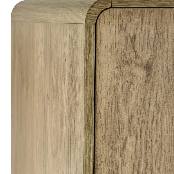 Close-up of a wooden cabinet with a natural finish