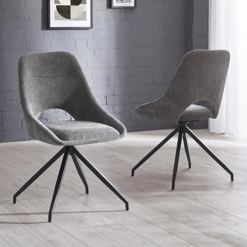Two gray upholstered chairs with black metal legs on a white background