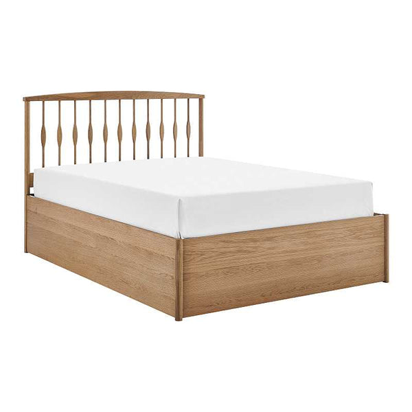 Wooden bed frame with white mattress on a white background