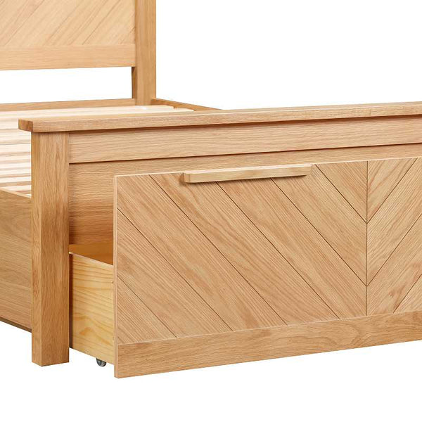 Wooden storage bench with a chevron pattern on a white background