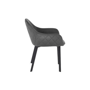 Gray quilted armchair with black legs on a white background