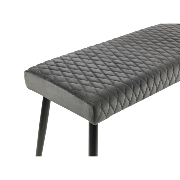 Gray quilted bench on a white background