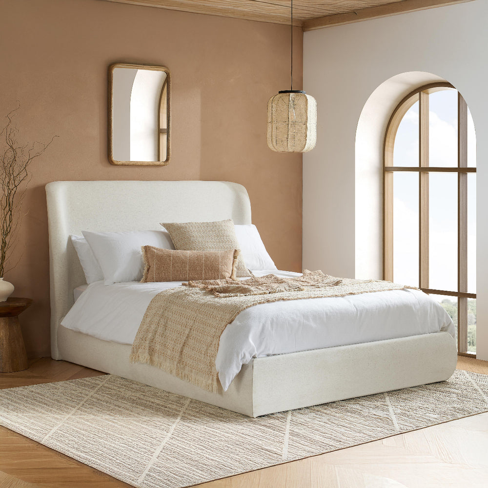 White bed frame with open storage compartment on a white background