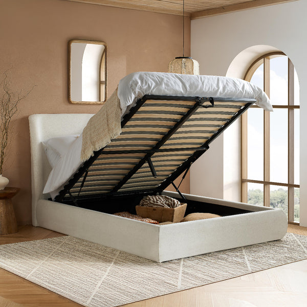 White bed with storage compartment in a bedroom setting