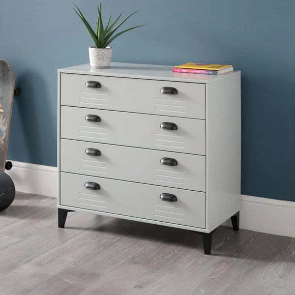 Grey dresser with black handles against a blue wall