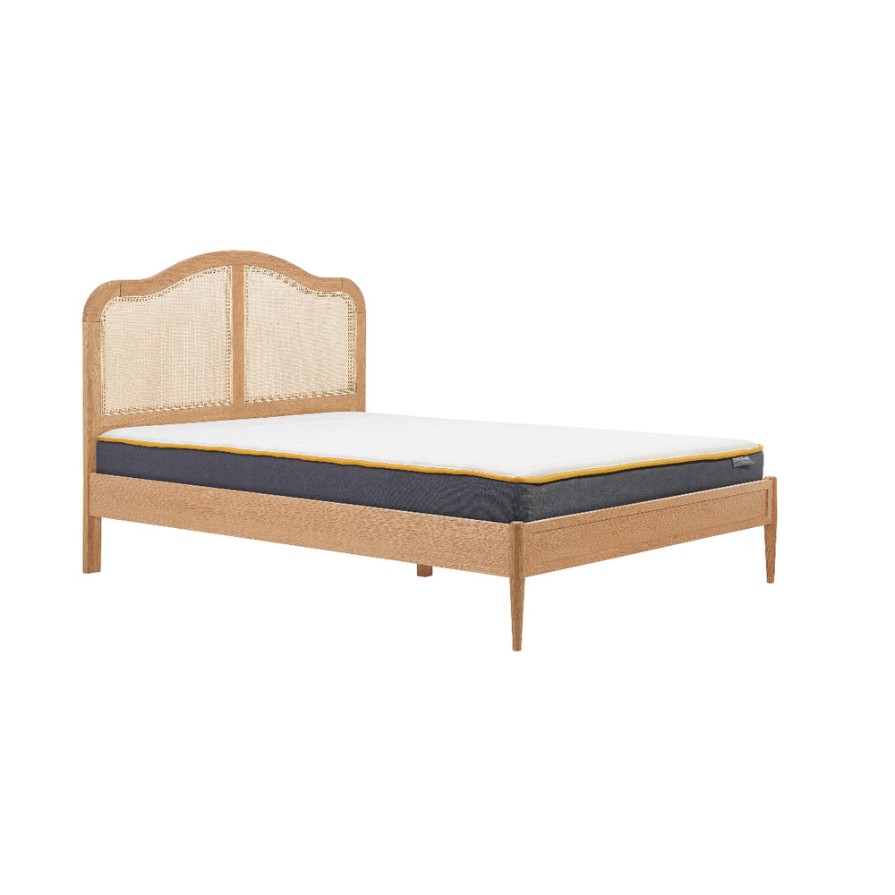 Wooden bed frame with mattress on a white background