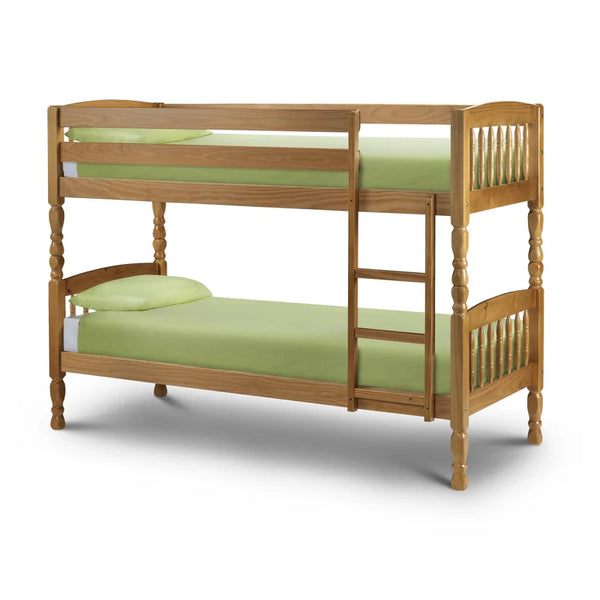 Wooden bunk bed with green mattresses on a white background