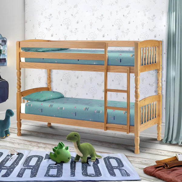 Wooden bunk bed with green bedding in a room with dinosaur toys and a rug.