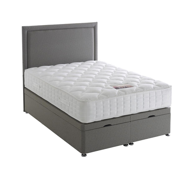 Gray bed frame with a white mattress on a white background