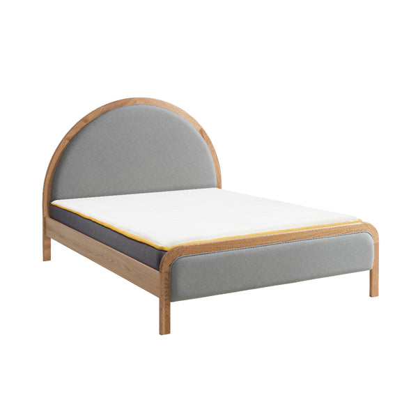 Bed with wooden frame and gray upholstered headboard on a white background