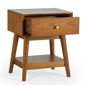 Wooden side table with a drawer on a white background