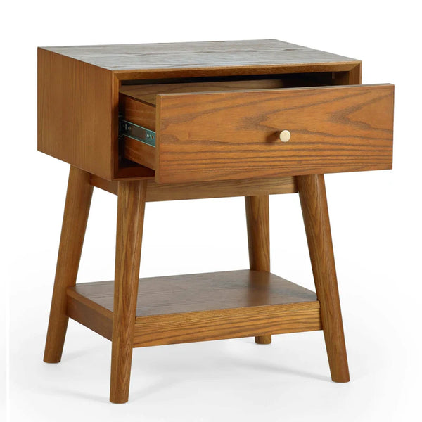Wooden side table with a drawer on a white background